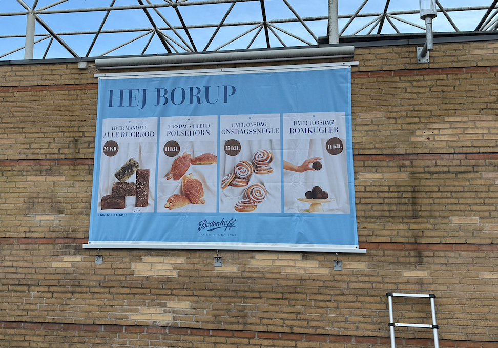 Bannermontage – Facadebanner med aluskinne – Bodenhoff